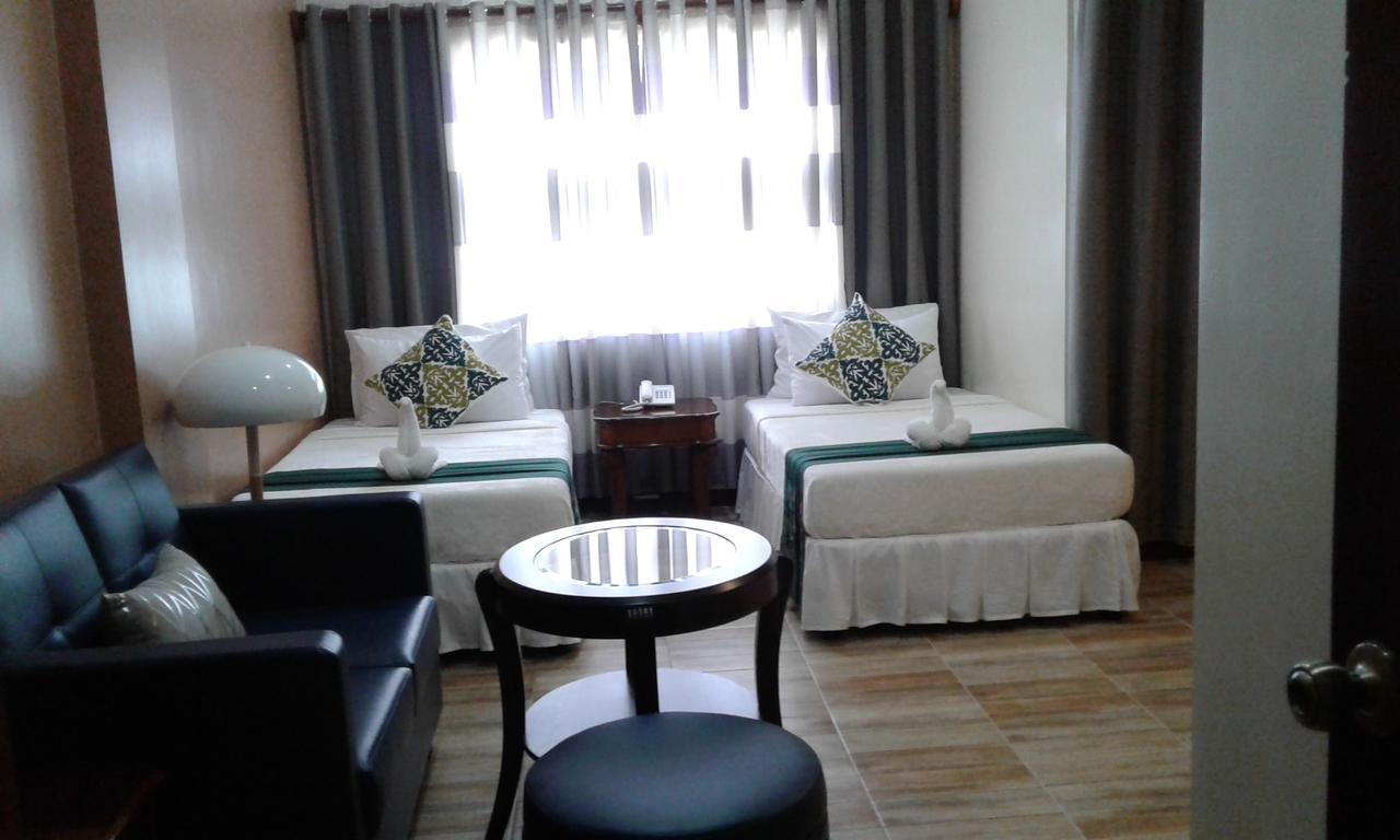 Charos Dormitel Hotell Dumaguete City Exteriör bild