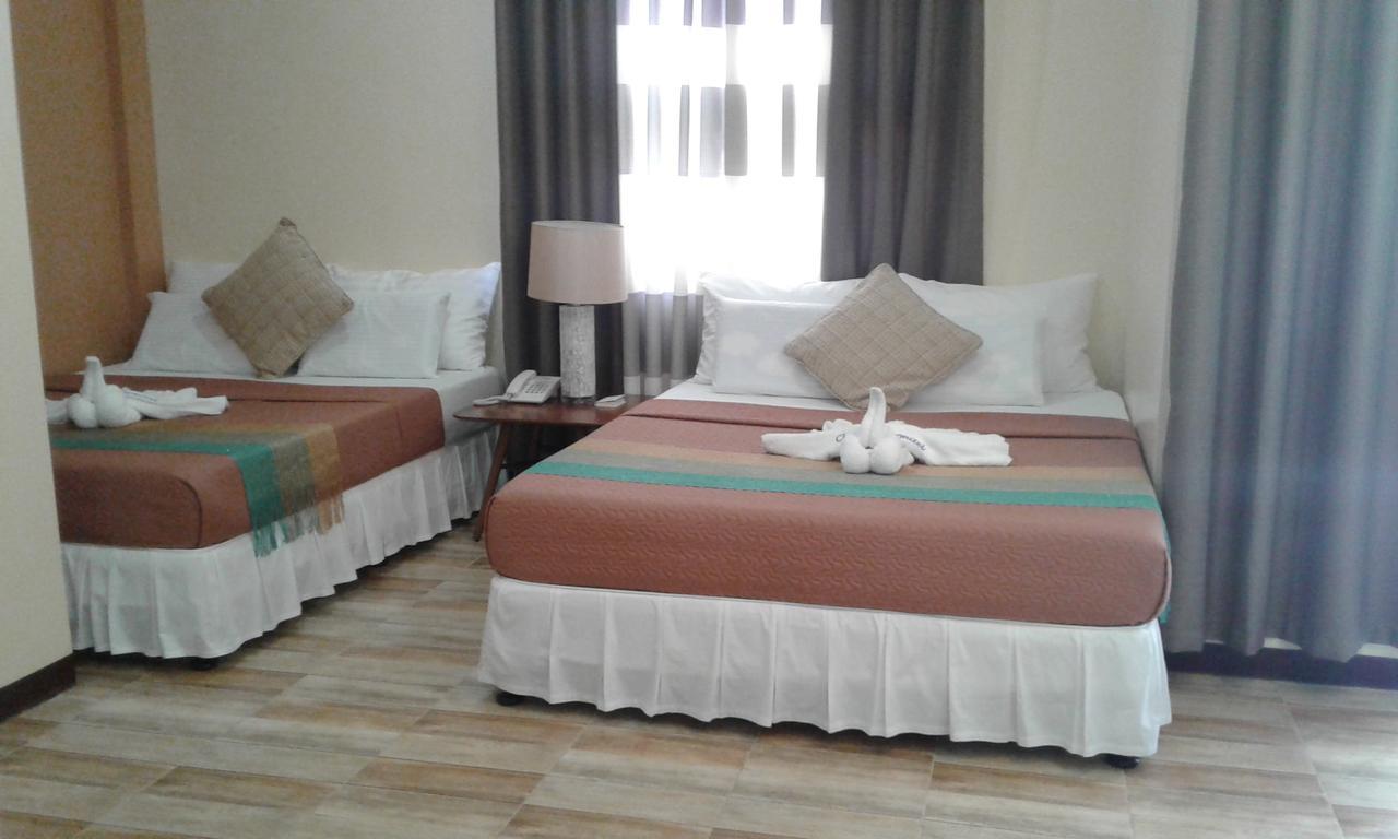 Charos Dormitel Hotell Dumaguete City Exteriör bild
