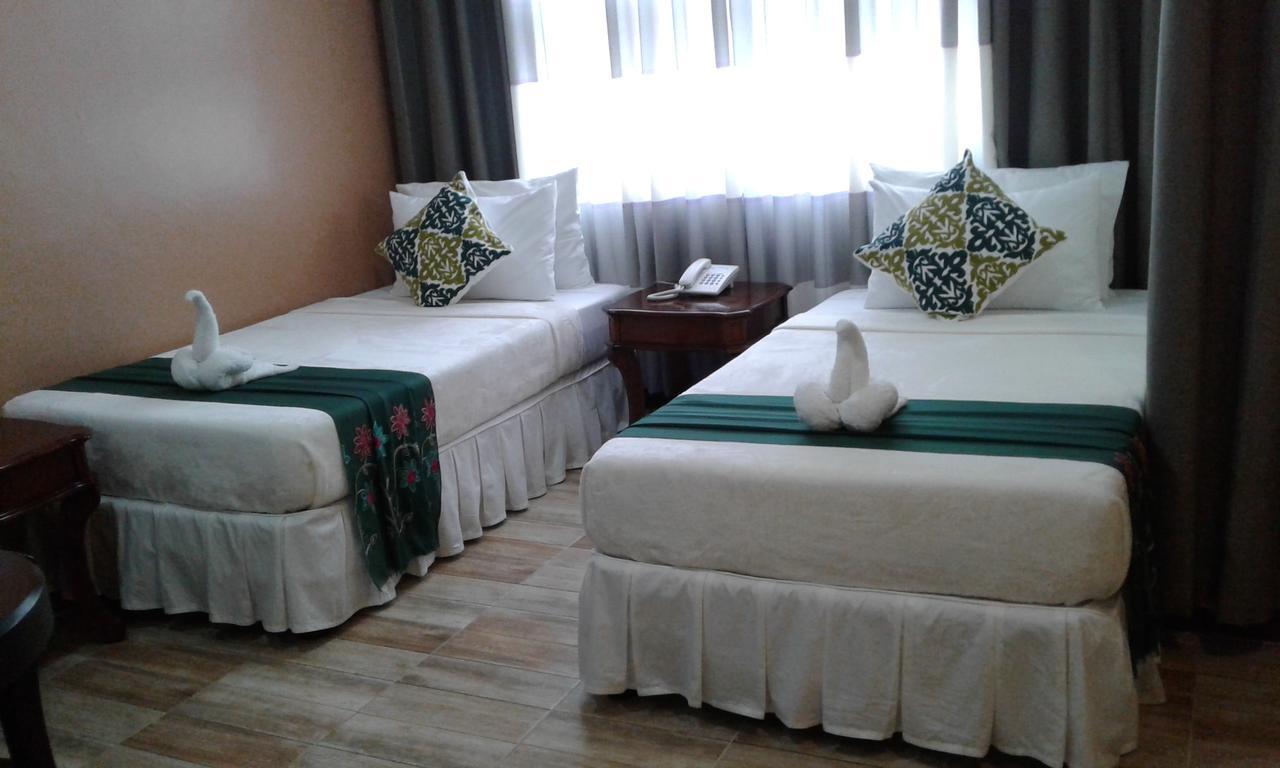 Charos Dormitel Hotell Dumaguete City Exteriör bild