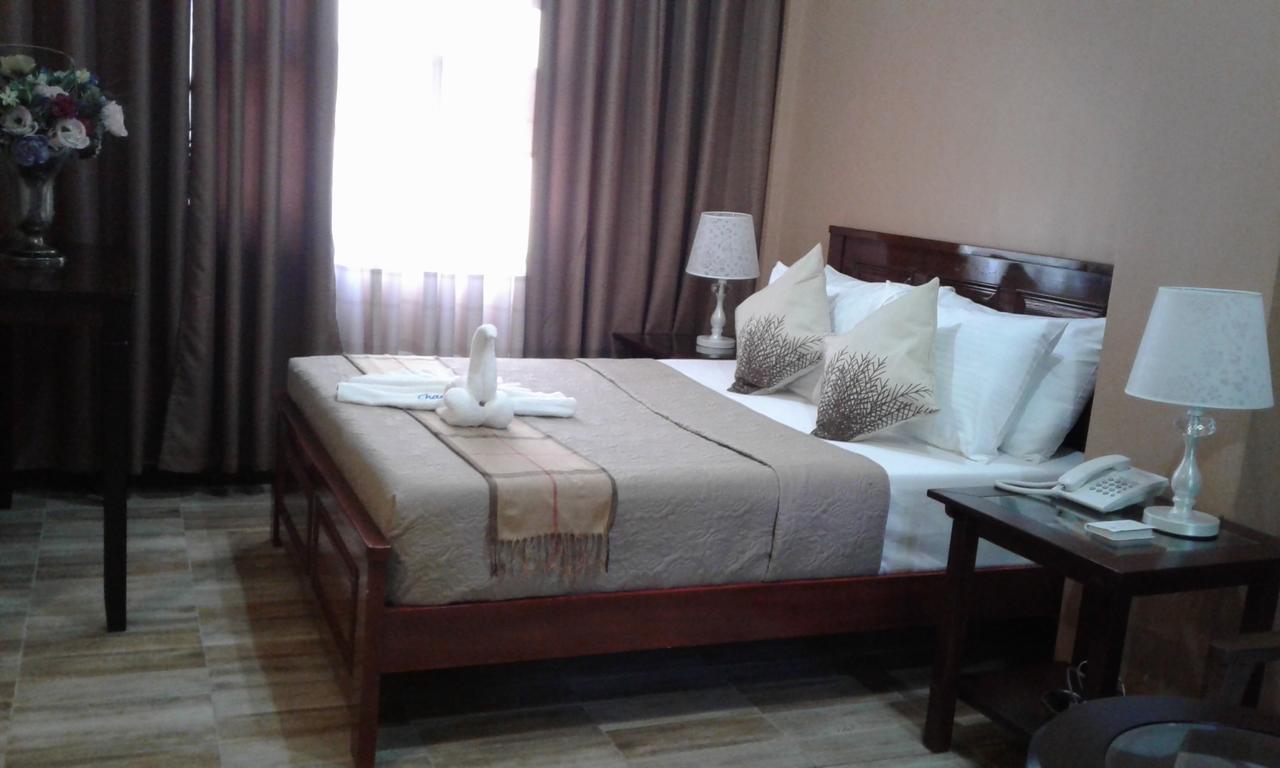 Charos Dormitel Hotell Dumaguete City Exteriör bild