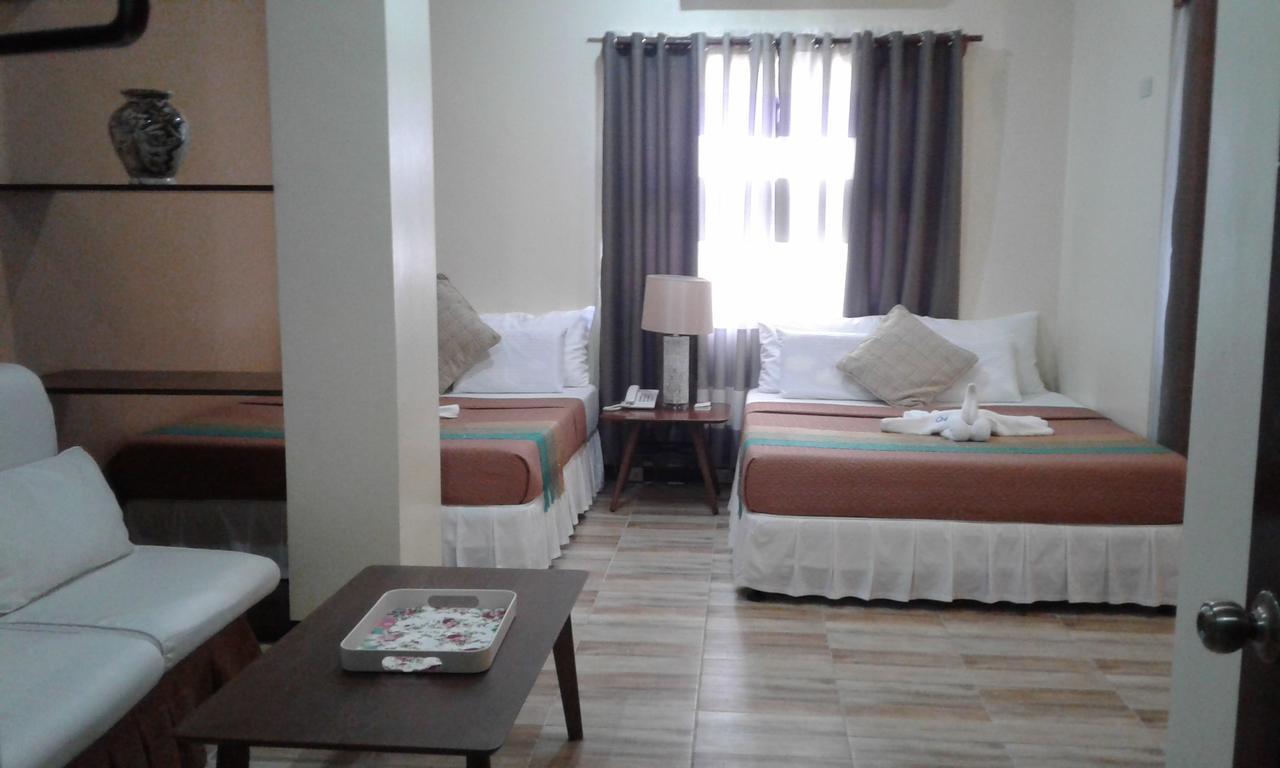 Charos Dormitel Hotell Dumaguete City Exteriör bild