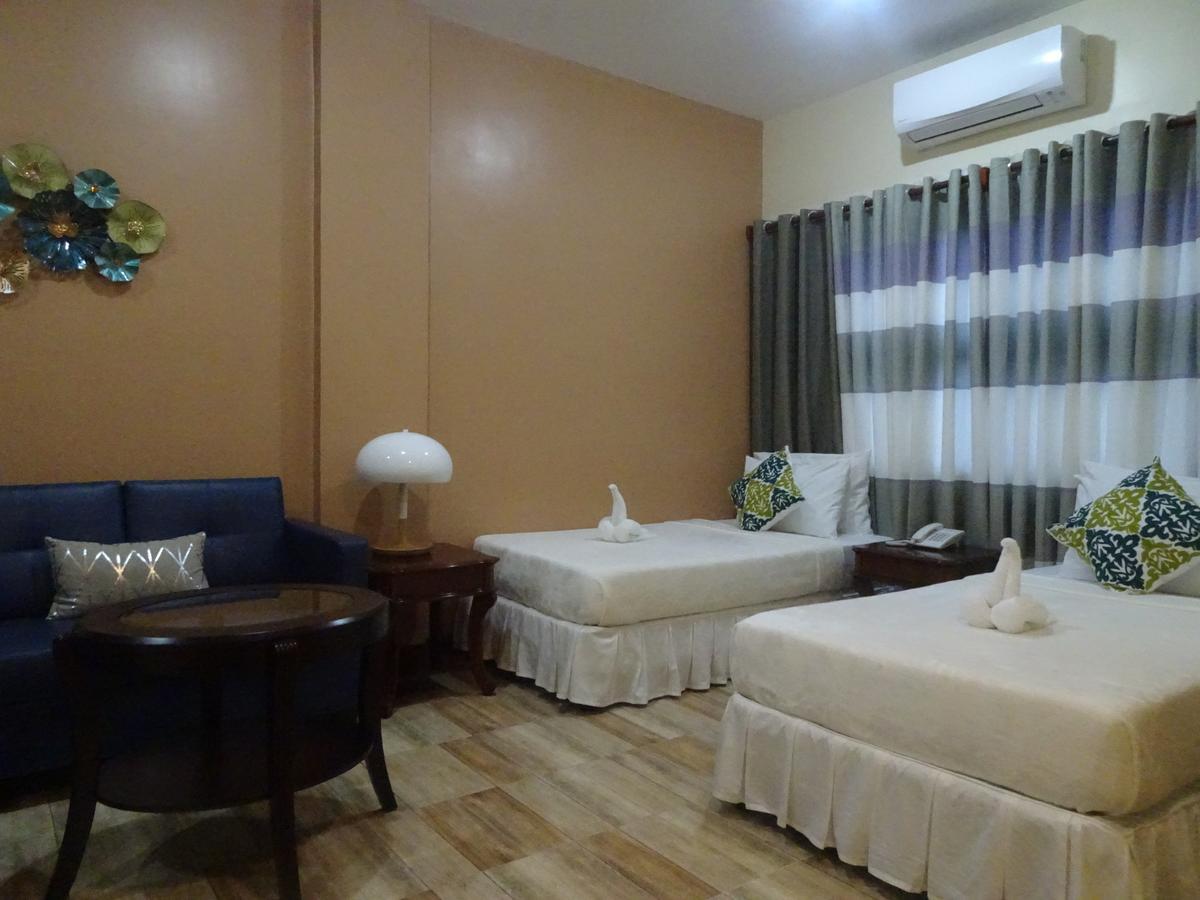 Charos Dormitel Hotell Dumaguete City Exteriör bild