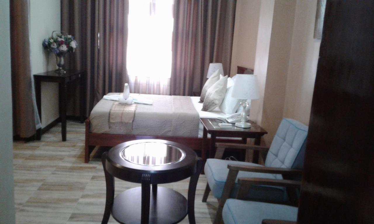 Charos Dormitel Hotell Dumaguete City Exteriör bild