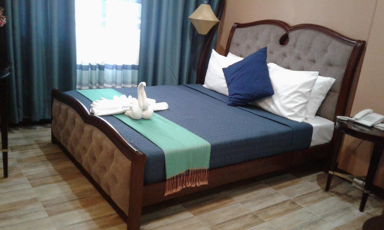 Charos Dormitel Hotell Dumaguete City Exteriör bild