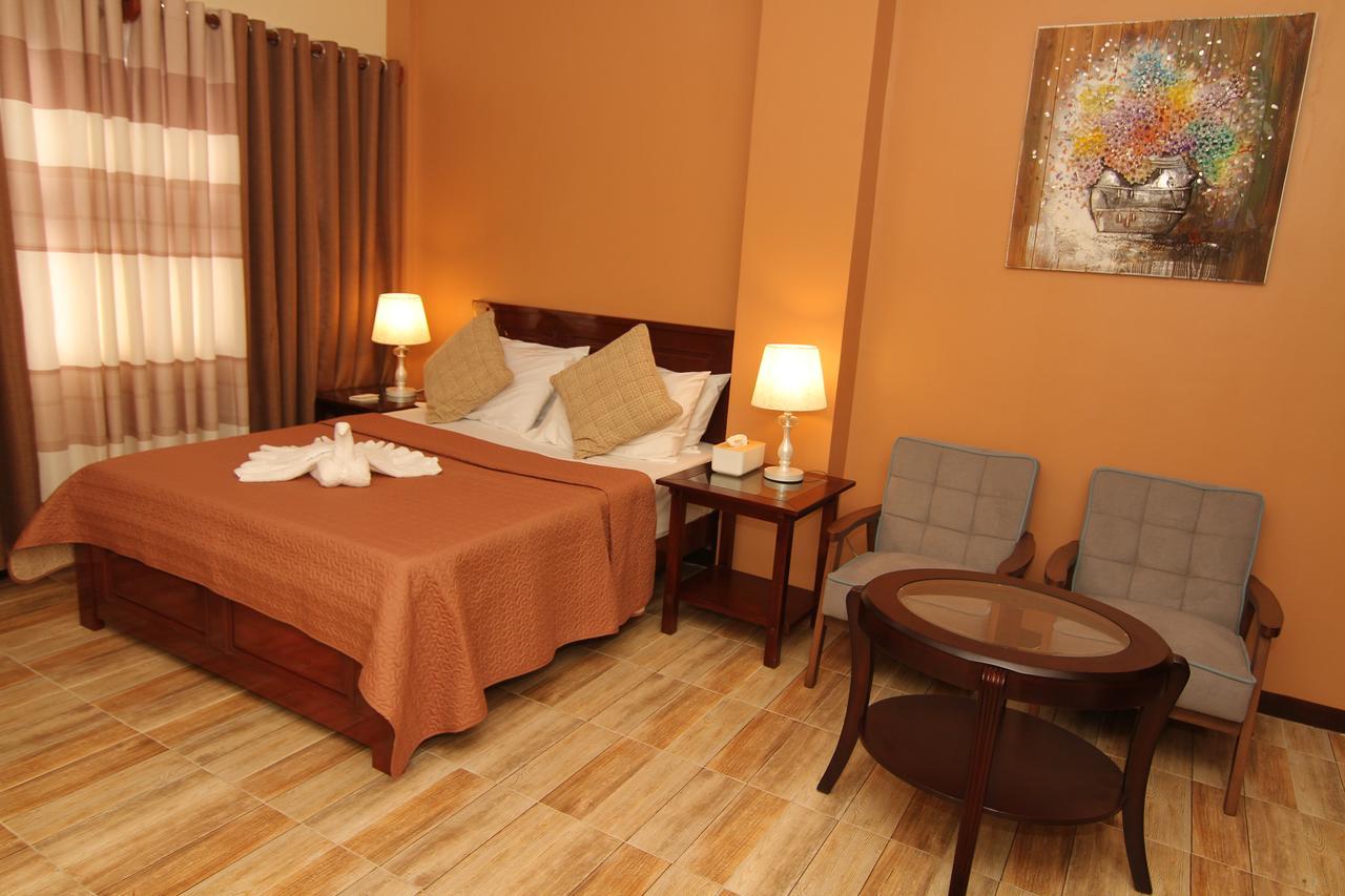 Charos Dormitel Hotell Dumaguete City Exteriör bild