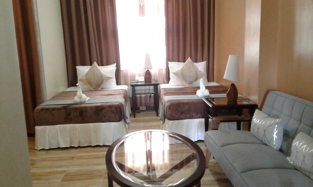 Charos Dormitel Hotell Dumaguete City Exteriör bild