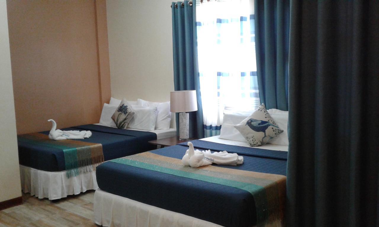 Charos Dormitel Hotell Dumaguete City Exteriör bild