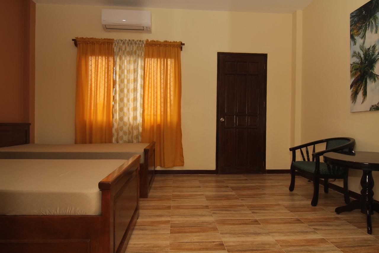 Charos Dormitel Hotell Dumaguete City Exteriör bild