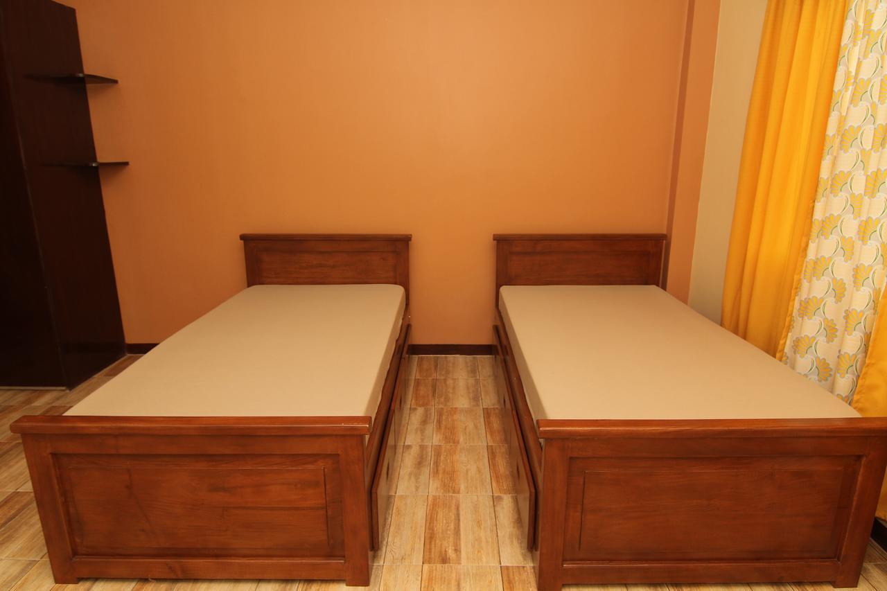 Charos Dormitel Hotell Dumaguete City Exteriör bild