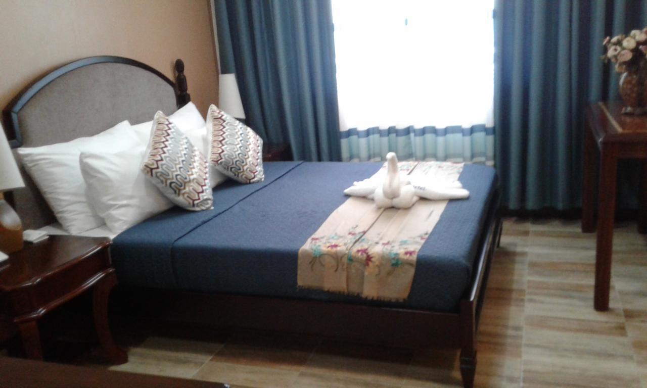 Charos Dormitel Hotell Dumaguete City Exteriör bild