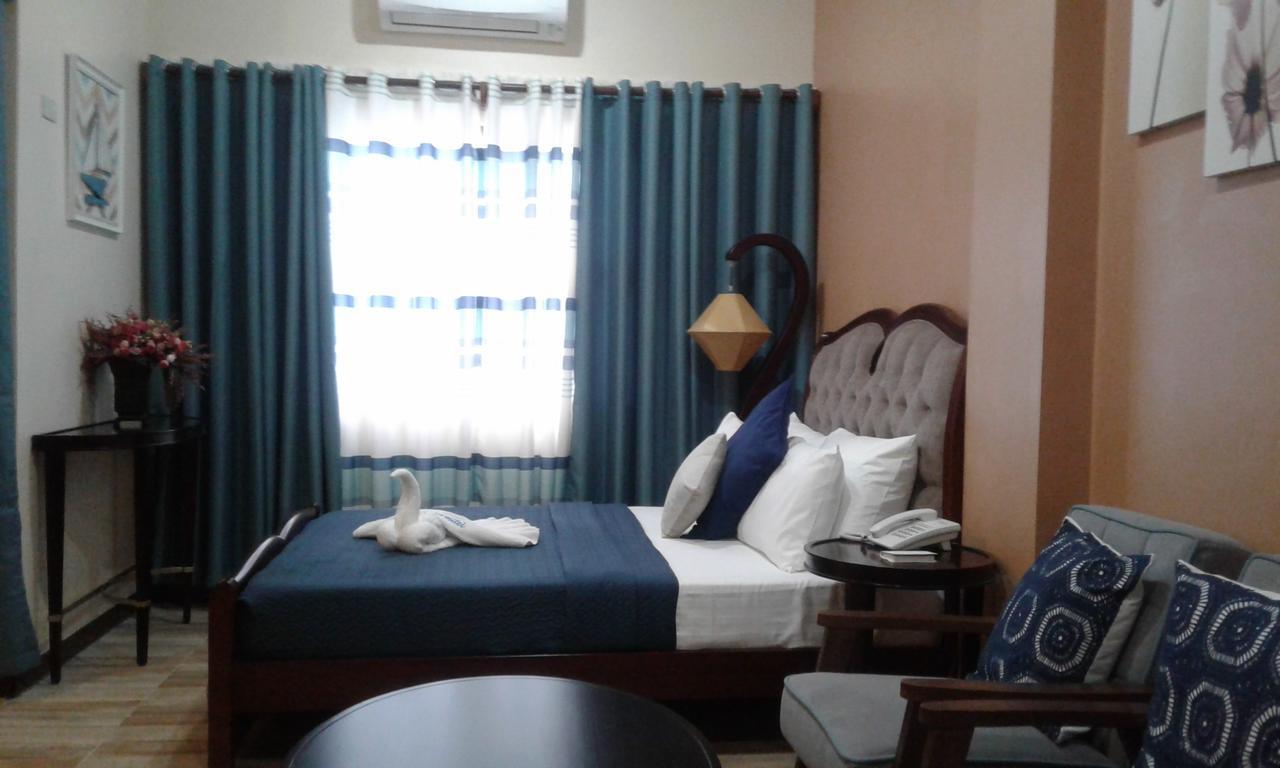 Charos Dormitel Hotell Dumaguete City Exteriör bild