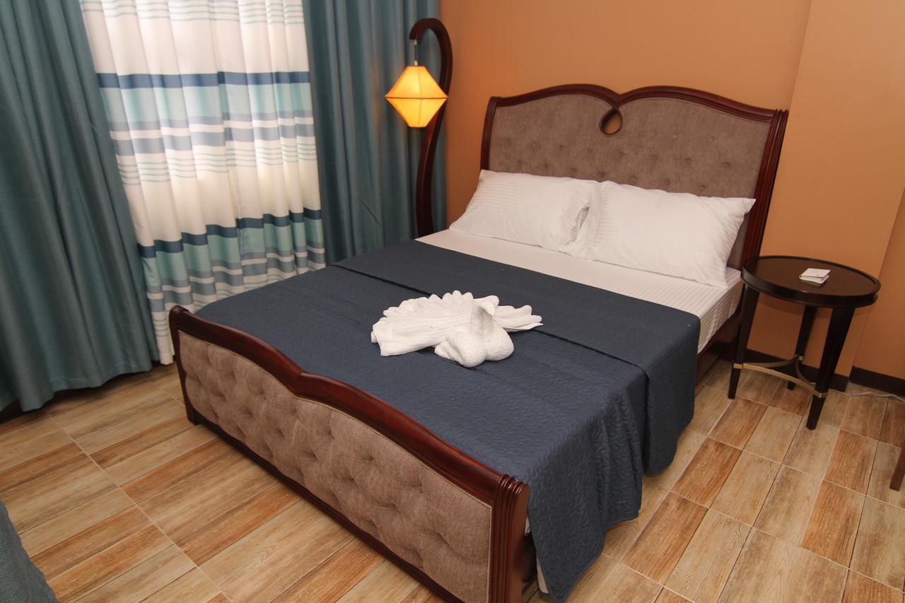 Charos Dormitel Hotell Dumaguete City Exteriör bild